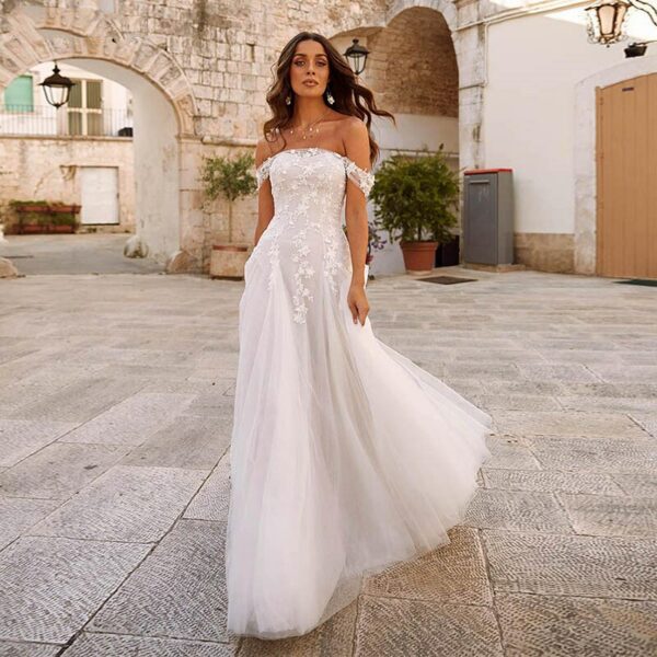 Off the shoulder boho wedding dresses - Image 4