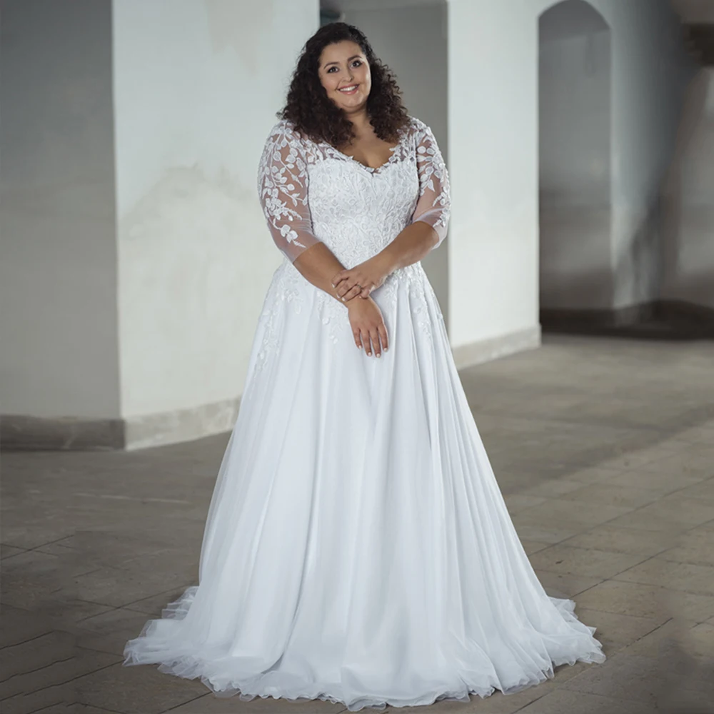 Plus size wedding dress with sleeves